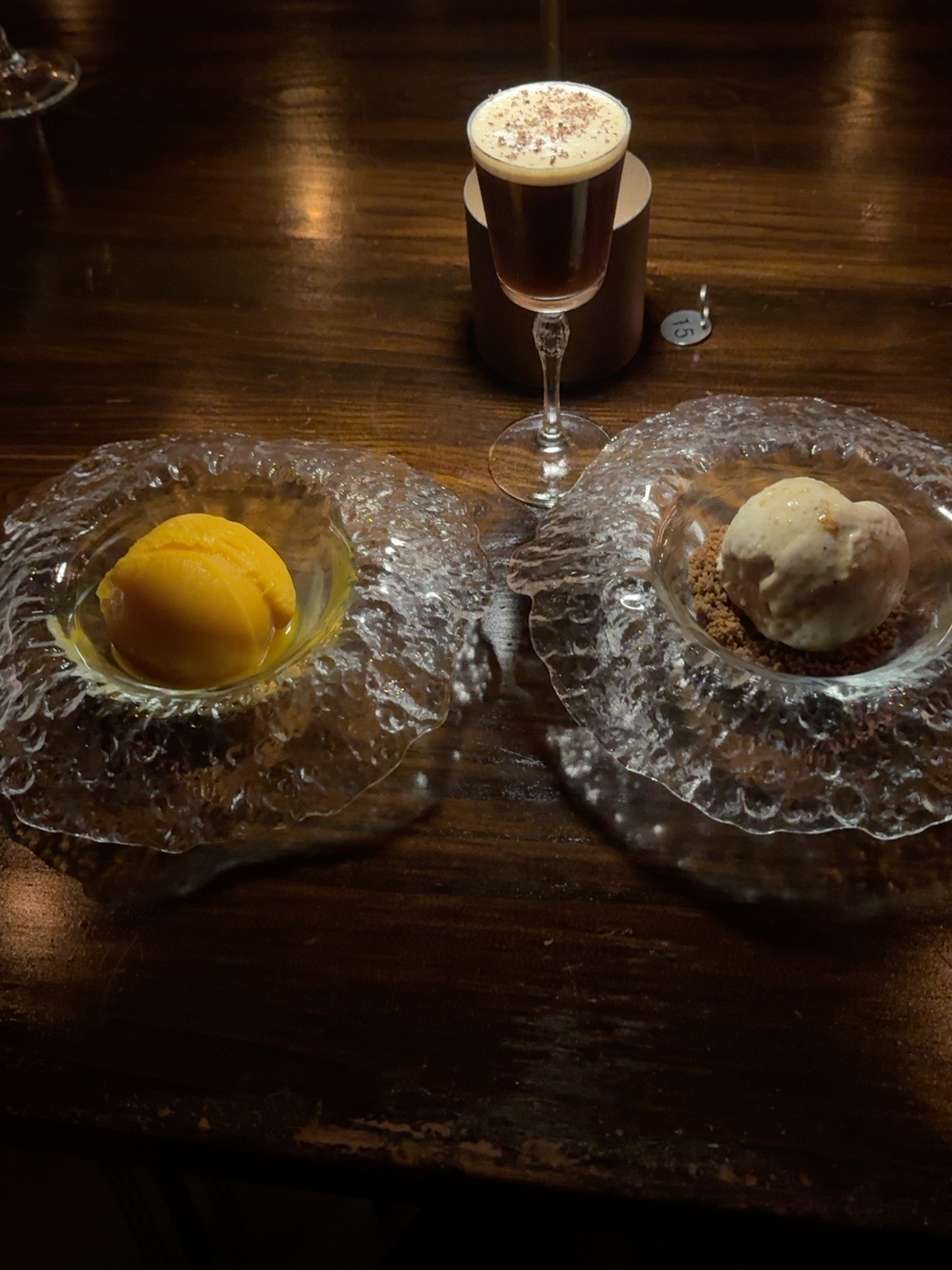 Dessert course at Aris Mediterranean Steakhouse with mango sorbet, baklava ice cream and a mini espresso martini