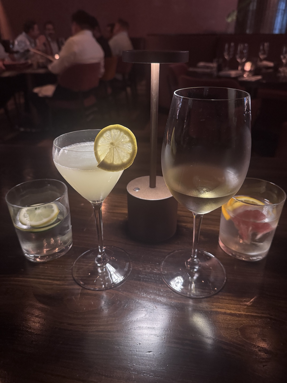 Lemon drop, wine pairing and garnished waters at Aris Mediterranean Steakhouse