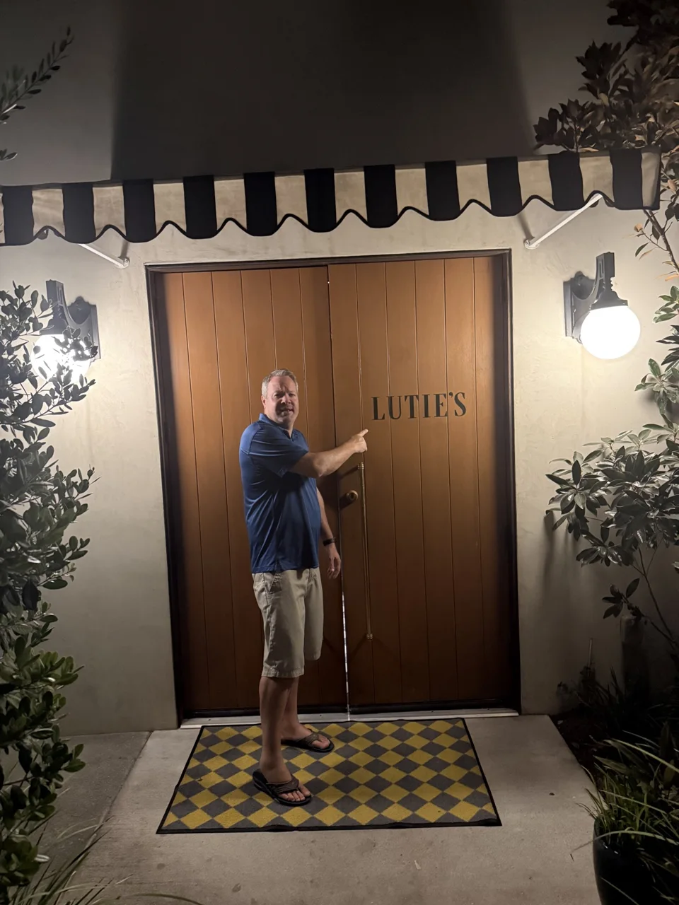 Mark outside the entrance to Lutie’s at Commodore Perry Estate