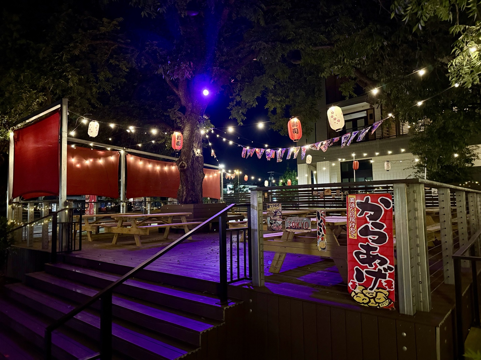 Nighttime patio at SOSU Izakaya and Sushi Bar in Austin