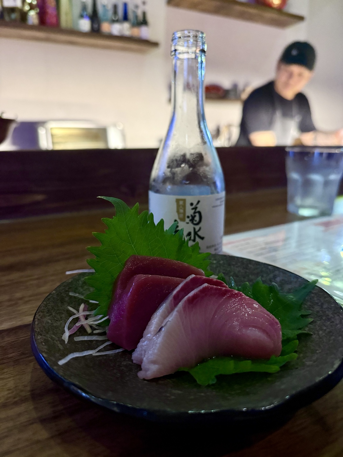 Sashimi and sake at SOSU Izakaya and Sushi Bar in Austin